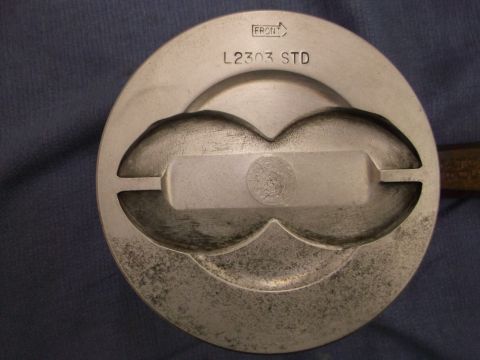 1971 Ford Ranchero - A single piston part is shown, marked with "FRONT" and "L2303 STD".