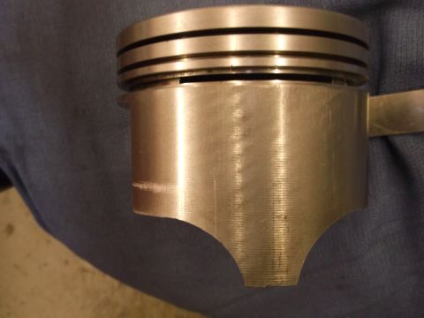 1971 Ford Ranchero - Close-up of an engine piston, showing its construction and ring grooves.
