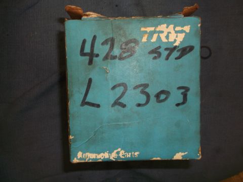 1971 Ford Ranchero - A TRW branded automotive parts box with handwritten identification numbers is shown against a dark background.