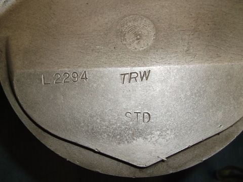 1971 Ford Ranchero - Close-up of a metal part showing stamped text and numbers.