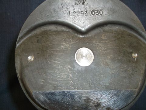 1971 Ford Ranchero - A close-up view of a TRW piston, showing its part number and some wear marks.