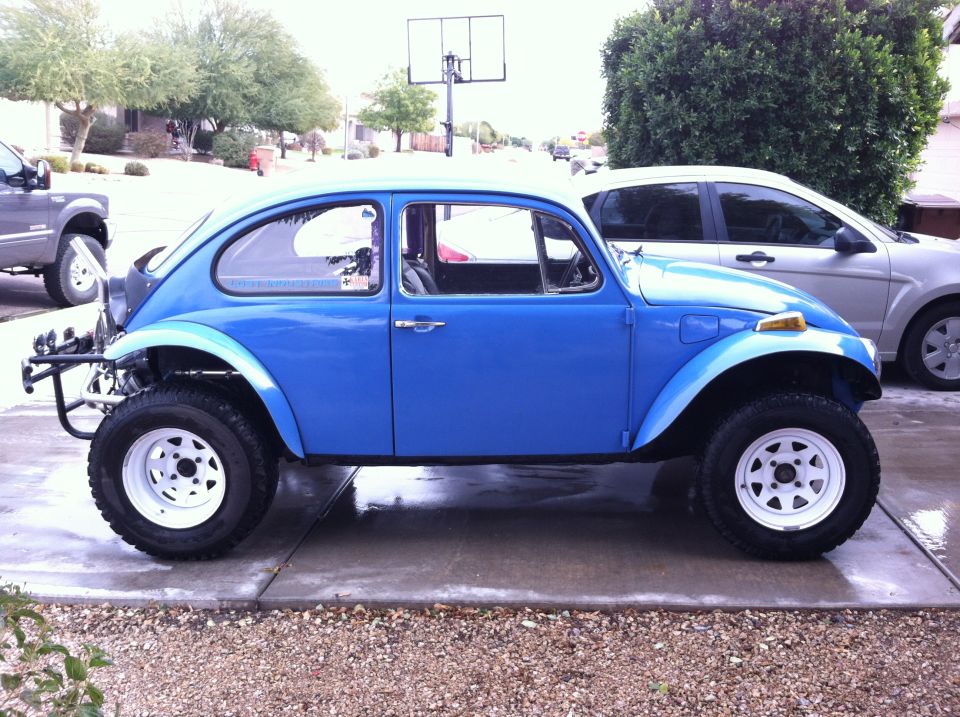Blue Baja Bug with off-road tires and custom bumper