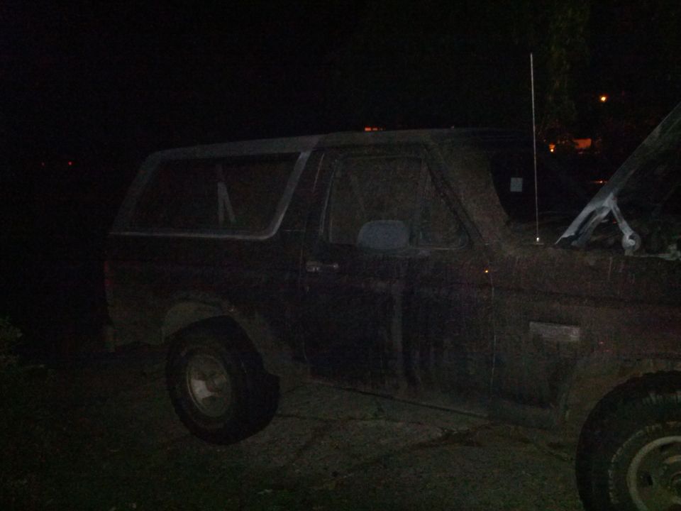 1995 Ford Bronco side view with hood open