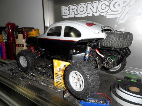 1996 Ford Bronco - This RC car features a classic Volkswagen Beetle body, modified with off-road tires and a spare tire mounted on the back.