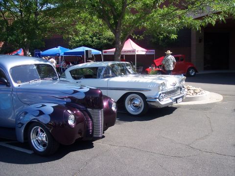 1972 Ford Ranchero - Two classic cars, a customized hot rod and a 1958 Chevrolet, displayed outdoors.
