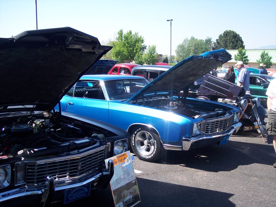 Blue 1972 Ford Ranchero with hood open, front 3/4 view
