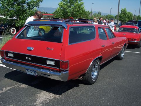 1972 Ford Ranchero - This red station wagon, likely a 1970 Chevrolet Chevelle SS, is seen from the rear with its distinctive SS badging and roof rack.