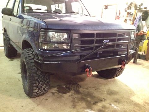 1996 Ford Bronco - This 1996 Ford Bronco features a custom front bumper and aggressive off-road tires, giving it a stance.