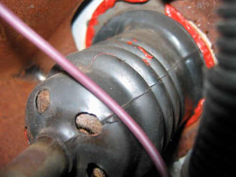 1992 Ford Bronco - inside the firewall where the brake booster comes through. looks like this is rusted out. Somehow water much have been coming in..