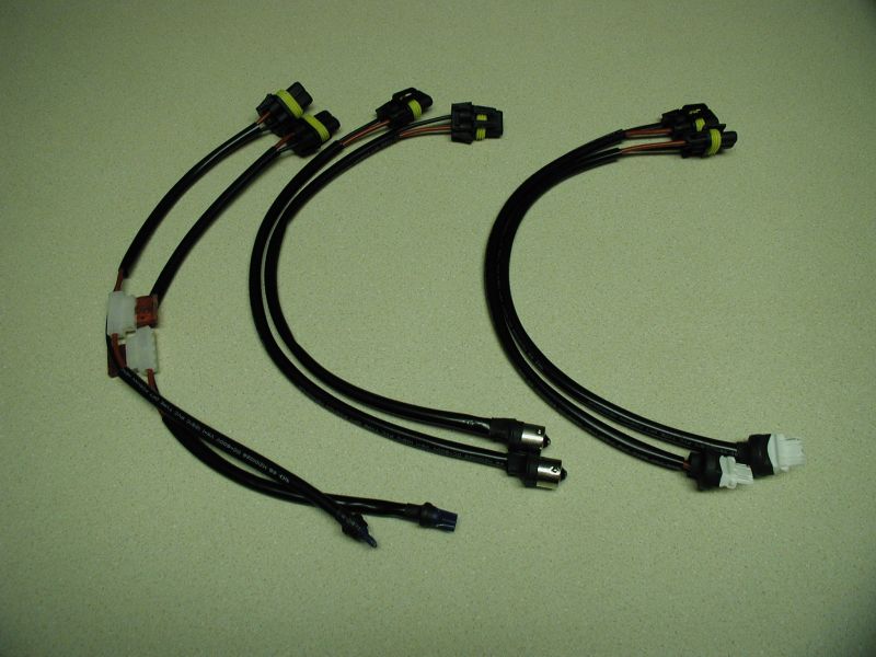 Wiring harness with multiple connectors and bulb sockets
