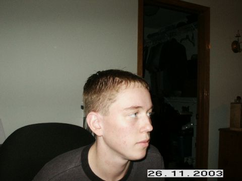 1998 Mercury Sable - A person is pictured in profile, with a closet visible in the background.