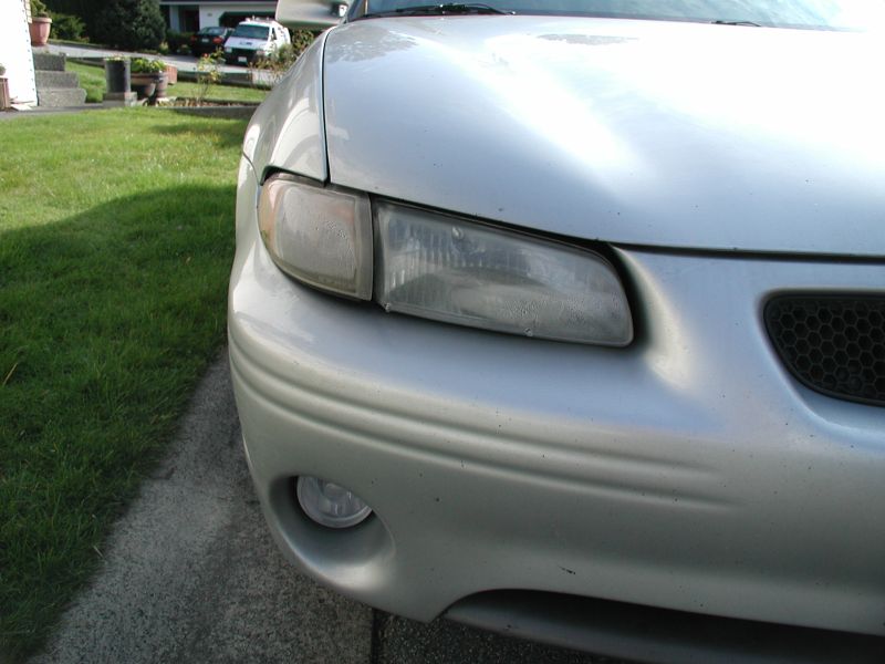 2002 Pontiac Grand Prix front corner, showing headlight and bumper detail