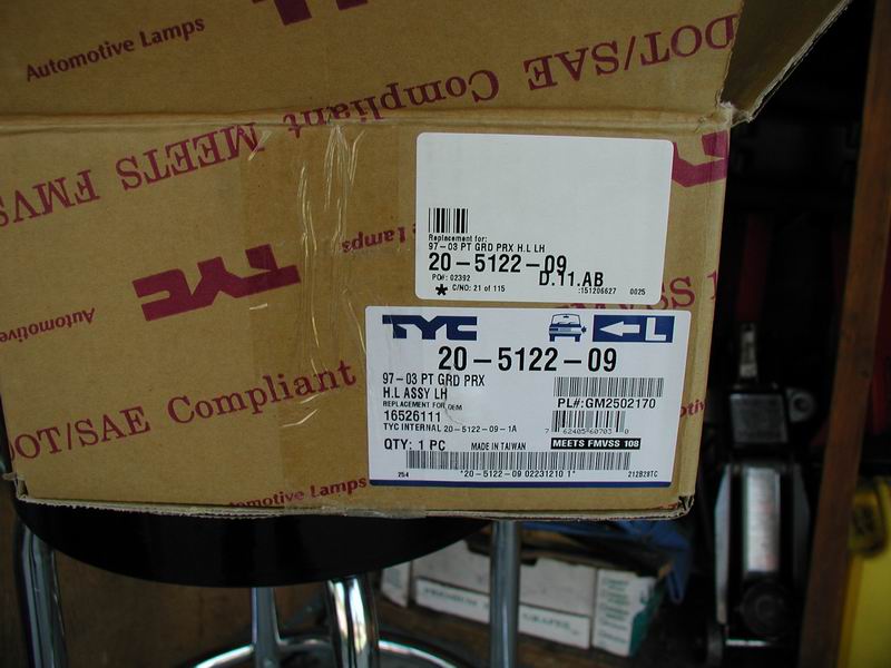 Cardboard box with TYC labels for 97-03 PT GRD PRX H.L ASSY LH