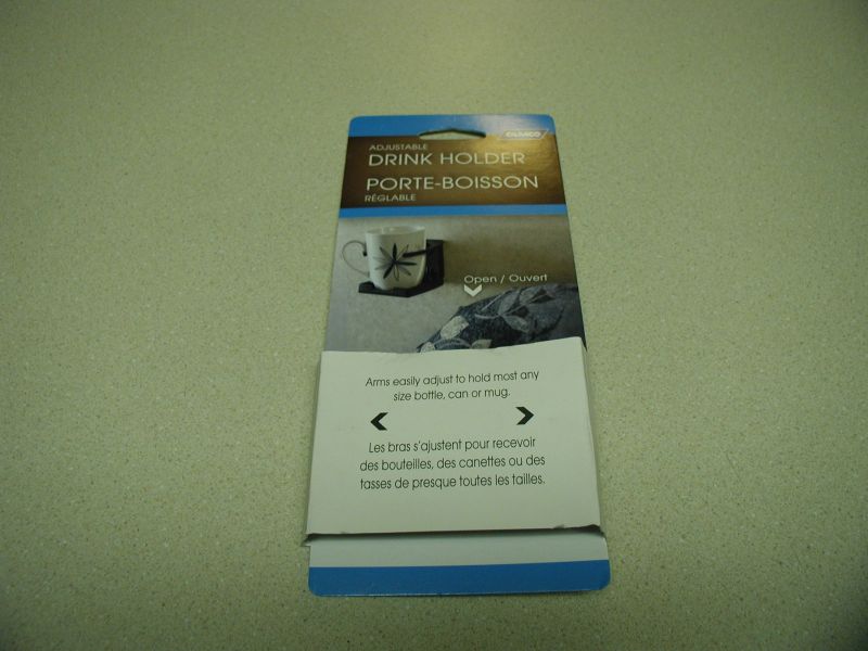Drink holder packaging with text and images of a mug