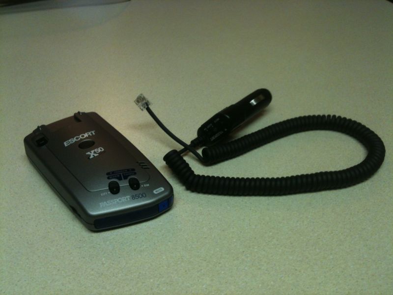 Escort Passport 8500 X50 radar detector and coiled power cord with car charger
