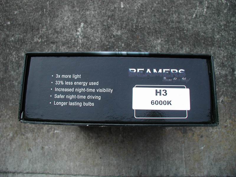 Black box with text listing bulb features and H3 6000K designation