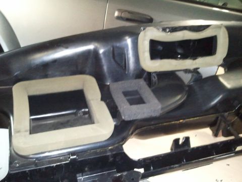 1994 Ford Bronco - Close-up of dashboard air vents, possibly being prepped for repair or modification.