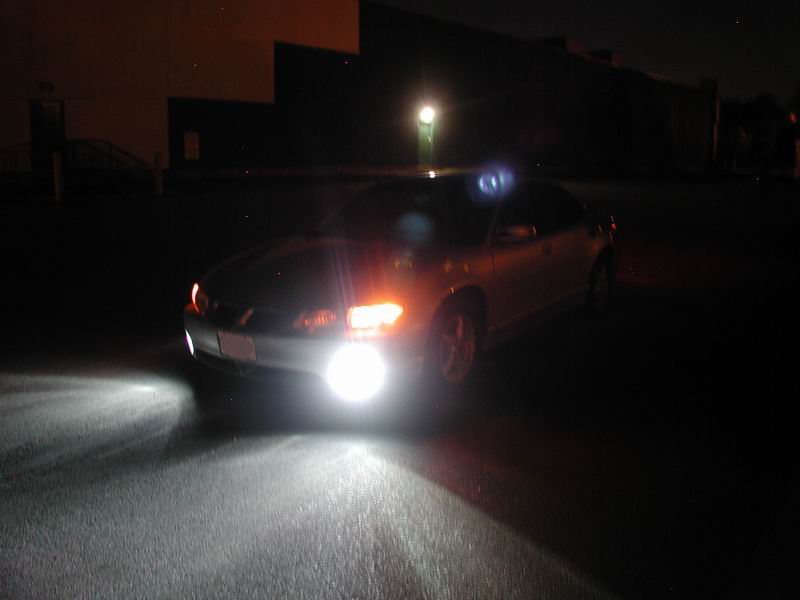 2002 Pontiac Grand Prix front view at night, headlights on