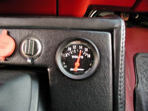 1990 Ford F-250 - A close-up of a voltmeter gauge on a vehicle's dashboard, displaying the electrical system's voltage.