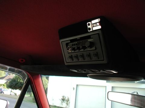 1990 Ford F-250 - Interior view of an overhead console with a CB radio and auxiliary switches.