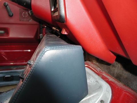 1990 Ford F-250 - Close-up view of the interior console and dashboard of a vehicle.