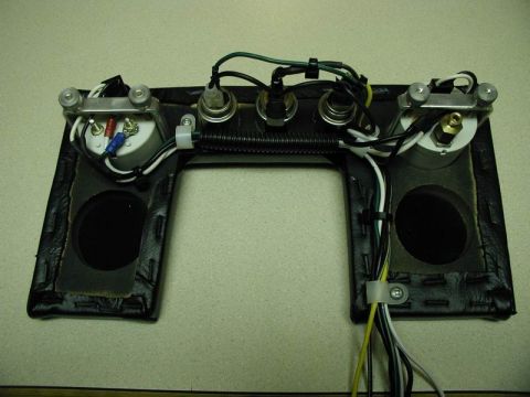 1990 Ford F-250 - This is a vehicle's gauge cluster assembly, showing the wiring and mounting points for gauges.