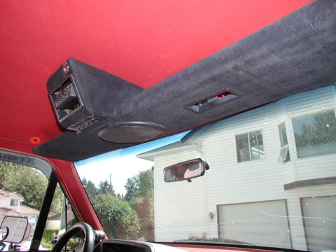 1990 Ford F-250 - Interior view of the overhead console and red headliner in a 1990 Ford F-250.