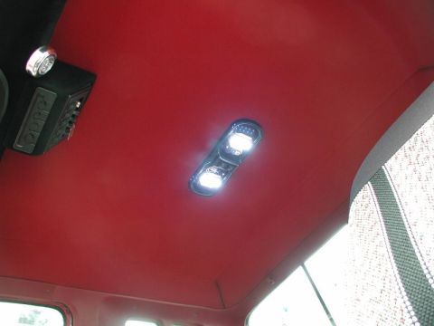 1990 Ford F-250 - Interior view of a 1990 Ford F-250, showing the overhead console and dome light.