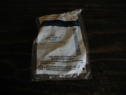 1990 Ford F-250 - This is a Ford sleeve part, part number F0FZ-14489-A, shown in its original packaging.