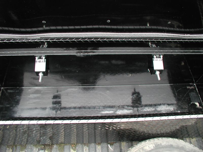 Black truck bed with hi-lift jack mount