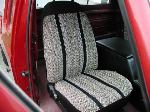 1990 Ford F-250 - Interior view of a red truck's patterned seat and console, with a watermark at the bottom right.
