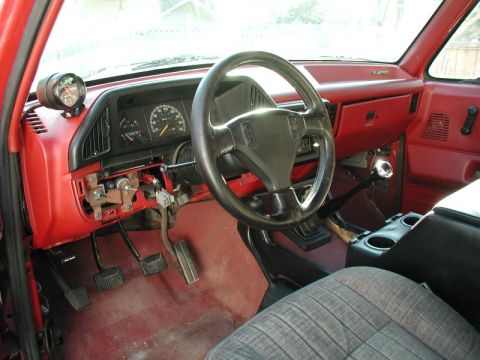 1990 Ford F-250 - Interior view of a 1990 Ford F-250, including dashboard and steering wheel.