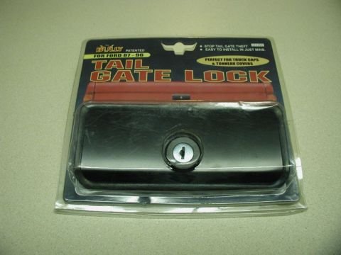 1990 Ford F-250 - Packaging for a Bully brand tailgate lock, advertised for Ford trucks from 1987-1996.