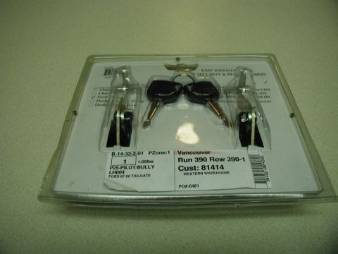 1990 Ford F-250 - A packaged set of tailgate locks and keys, labeled for Ford trucks from 1987-1996.