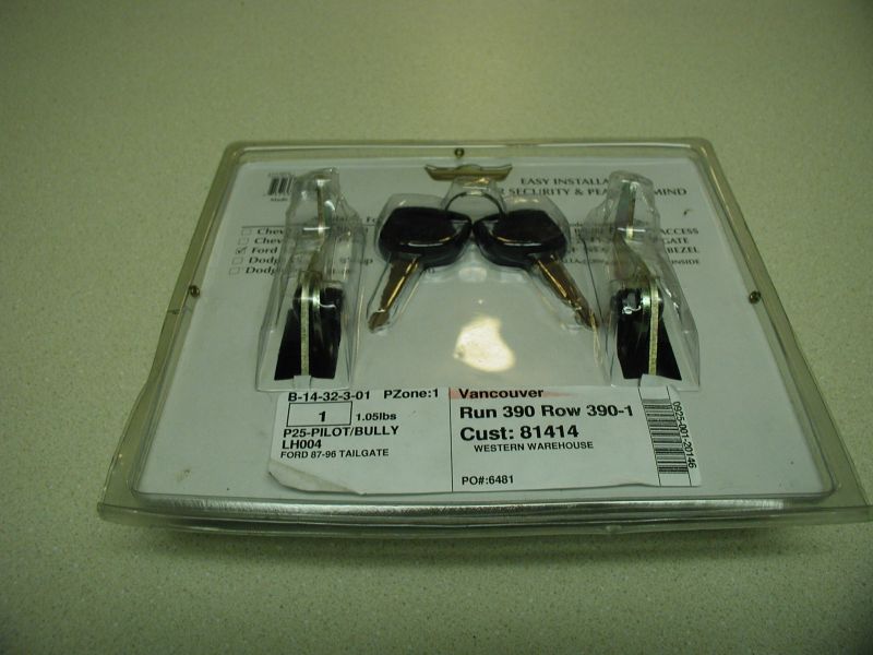 Package with three sets of keys and tailgate locks. Label says Ford 87-96 Tailgate
