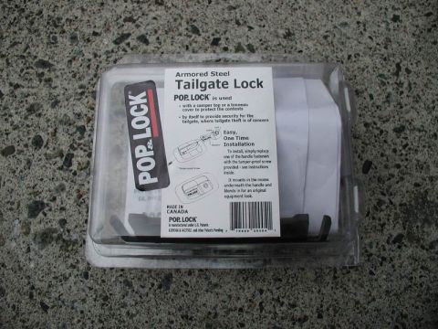 1990 Ford F-250 - The photo shows the packaging for a POP & LOCK Armored Steel Tailgate Lock, not a 1990 Ford F-250.
