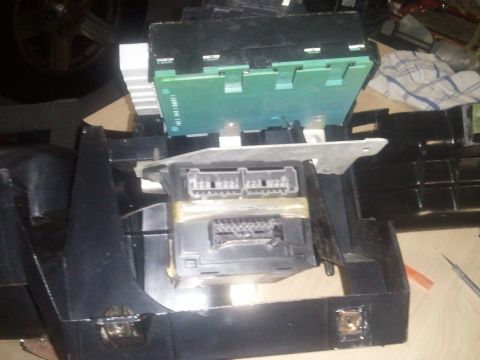 1994 Ford Bronco - This photo shows the internal electronic components of a vehicle's dashboard, likely related to the wiring or control systems.