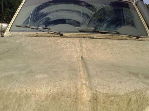 1988 Ford Bronco - Redneck Yacht Club - What happens to the hood when you drive 30mph into a deep hole with water a foot deeper than the hood, have a huge wav…