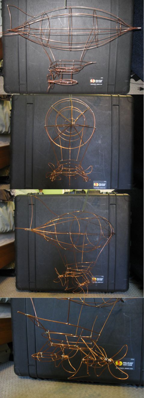 1989 Ford Bronco - Several wireframe models of airships are displayed against a dark background.