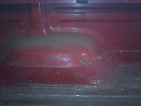 1978 Ford Bronco - The interior floor of the vehicle shows signs of age and use.