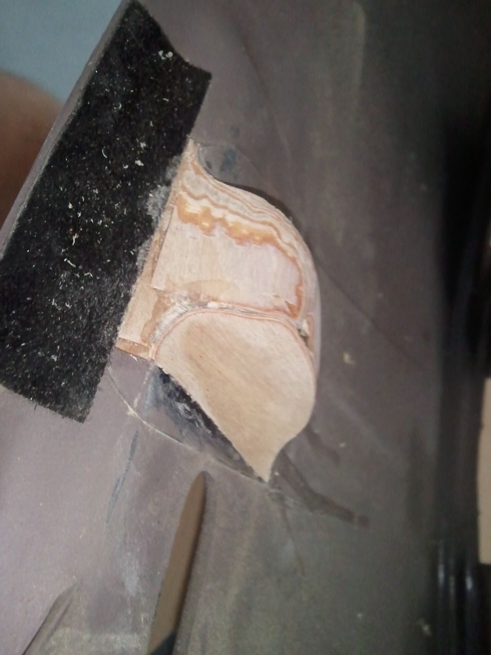 Dashboard trim with wood filler and black felt