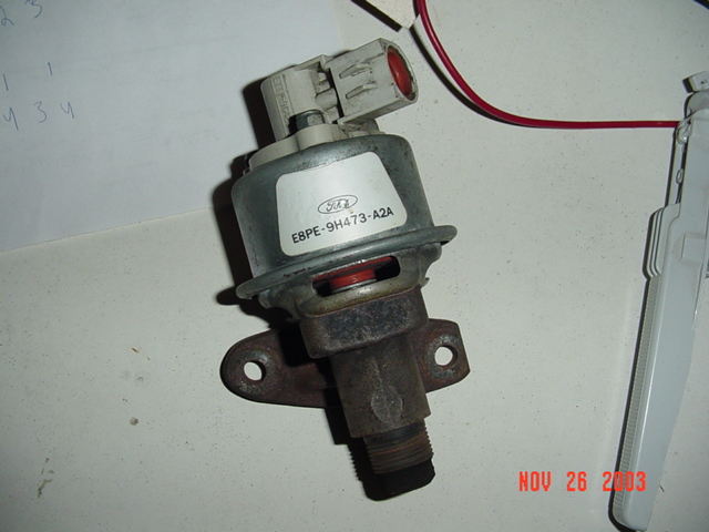 Ford fuel pressure regulator part E8PE-9H473-A2A with wiring on a bench