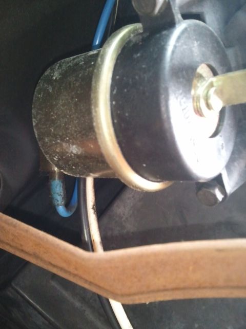 1994 Ford Bronco - A close-up view of an automotive part with visible wiring, likely from the interior of a vehicle.
