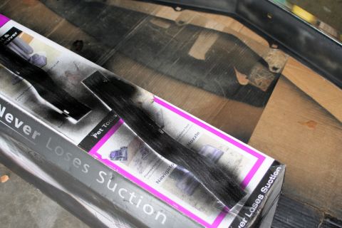 1976 Ford Ranchero - The photo shows vacuum cleaner parts laid out on a cardboard surface, with a product box visible.