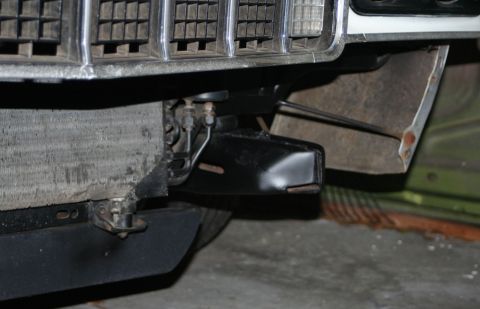 1976 Ford Ranchero - The front grille and radiator of a vehicle are visible, with a SuperMotors.net watermark in the lower right corner.
