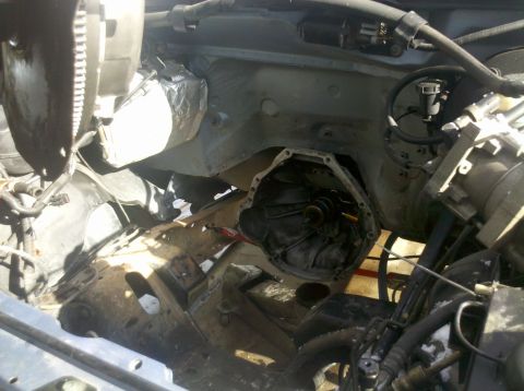1996 Ford Bronco - Had to replace input shaft Seal on the Mazda Dog. 13mm bolts, cover comes off. There is a metal sleeve on the bottom and upper has a seal.…