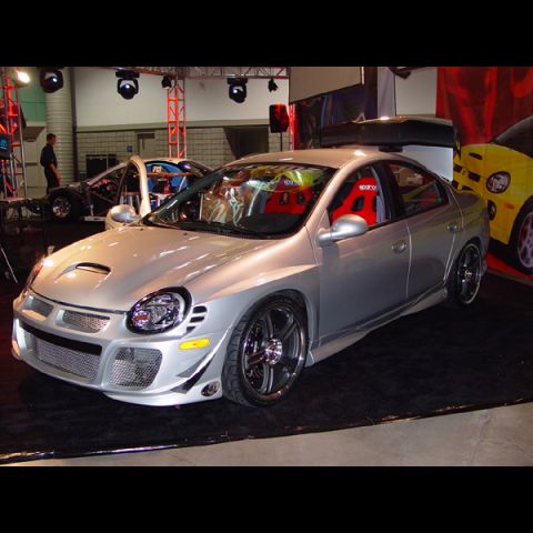 1986 Ford LTD Crown Victoria - Modified Dodge Neon SRT-4 on display with racing seats and custom bodywork.