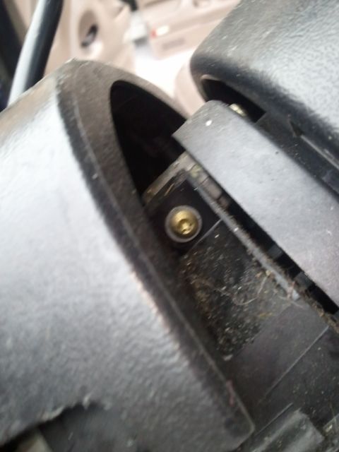 1994 Ford Bronco - Detail of interior trim and a visible screw, likely part of the dashboard assembly.
