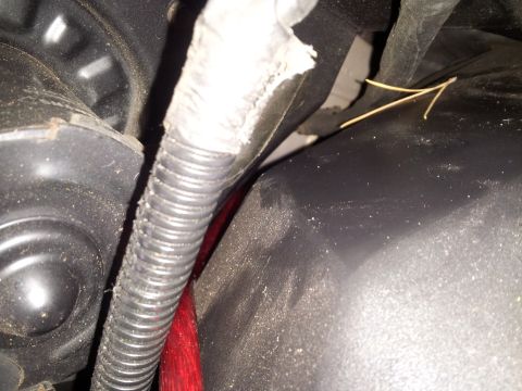 1998 Mercury Grand Marquis - WIRE COMING THROUGH THE GRAMET