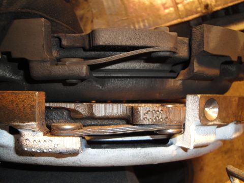 1992 Ford Taurus - Close-up view of a vehicle's clutch pressure plate and disc assembly.